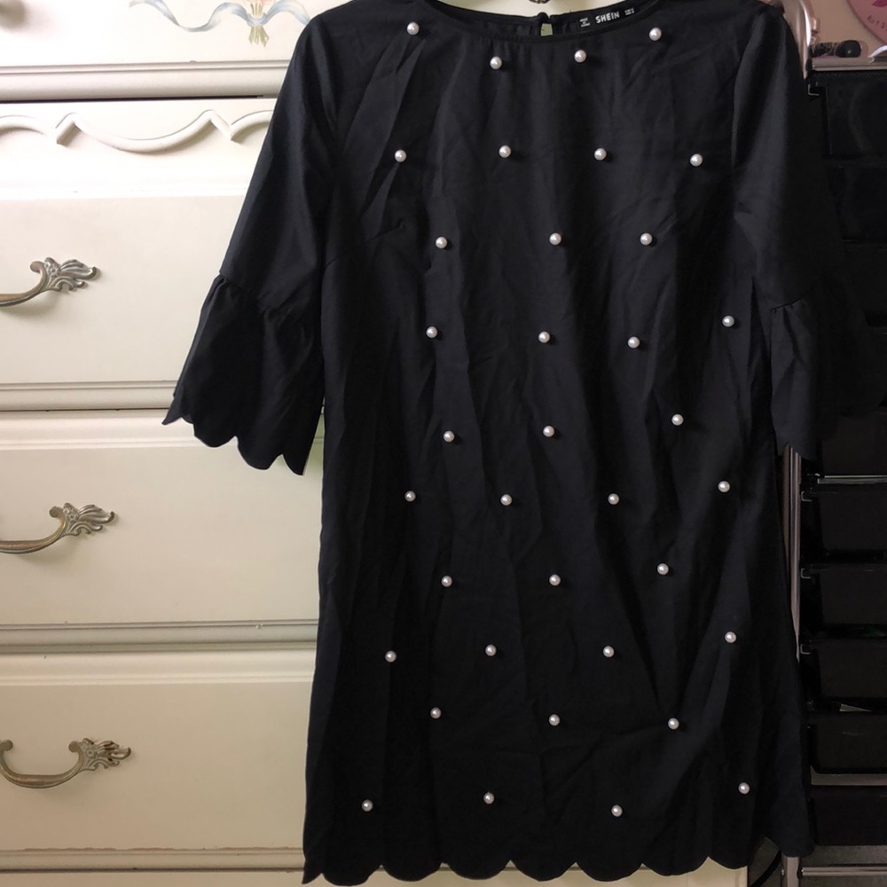 Scalloped black pearl dress